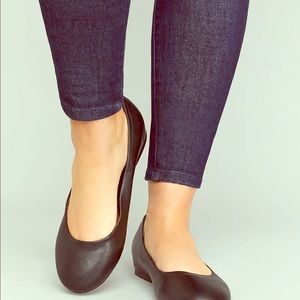 Black faux leather flats